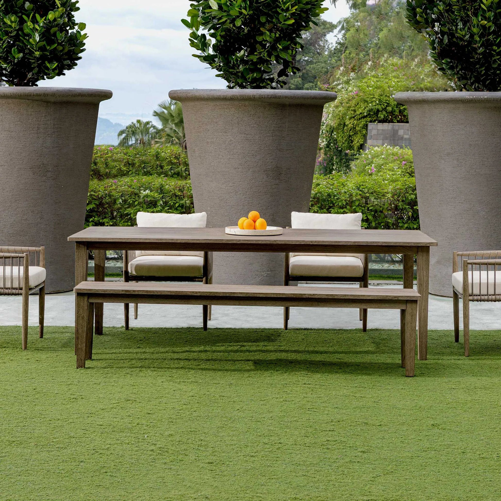 Forsyth Outdoor Bench by Uttermost in dark gray. Made from mahogani wood in a transitional style.