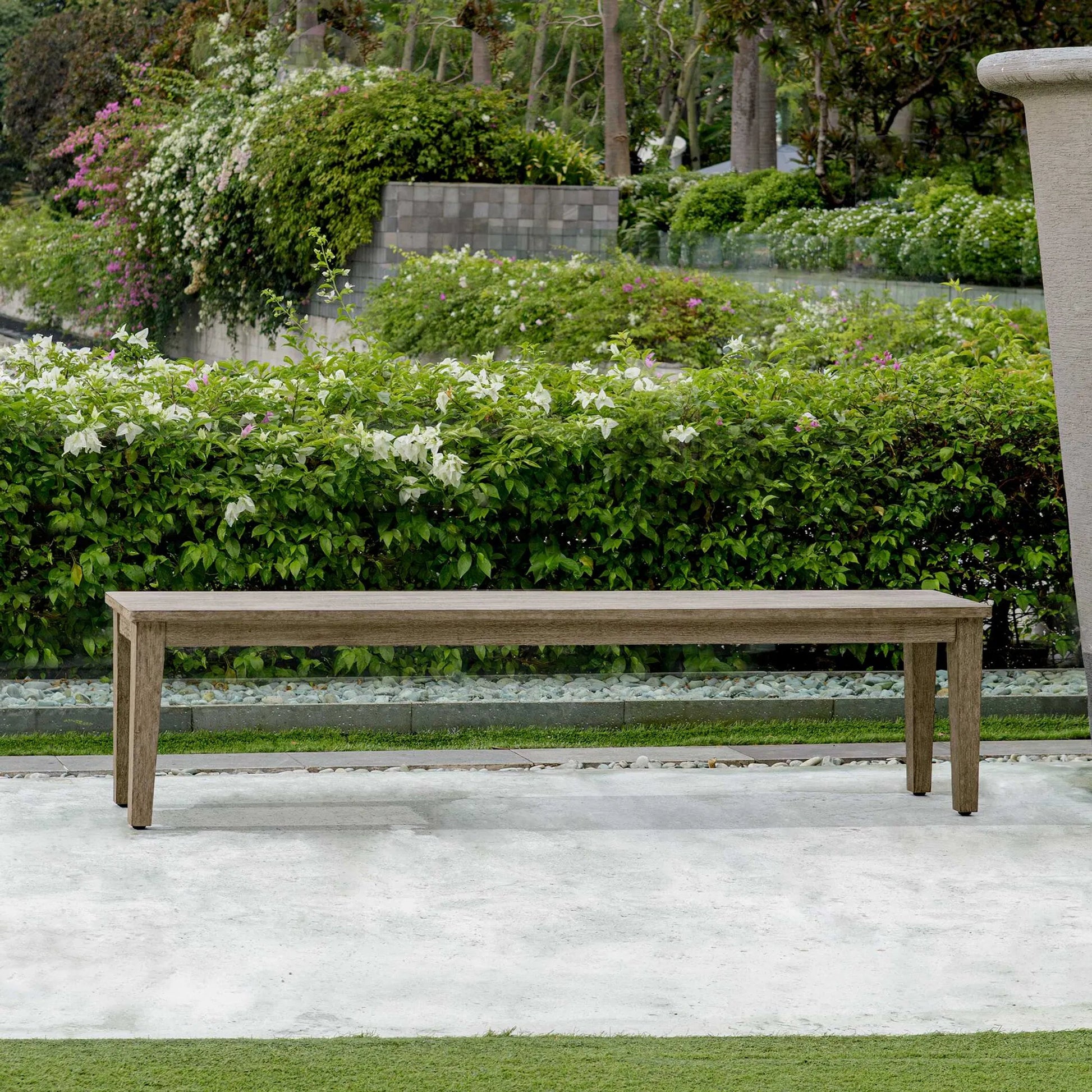 Forsyth Outdoor Bench by Uttermost in dark gray. Made from mahogani wood in a transitional style.