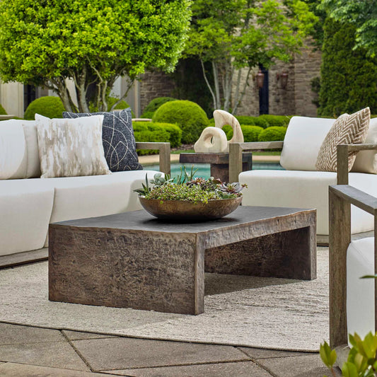 Obra Outdoor Coffee Table by Uttermost in dark bronze. Made from metal in a unique style.