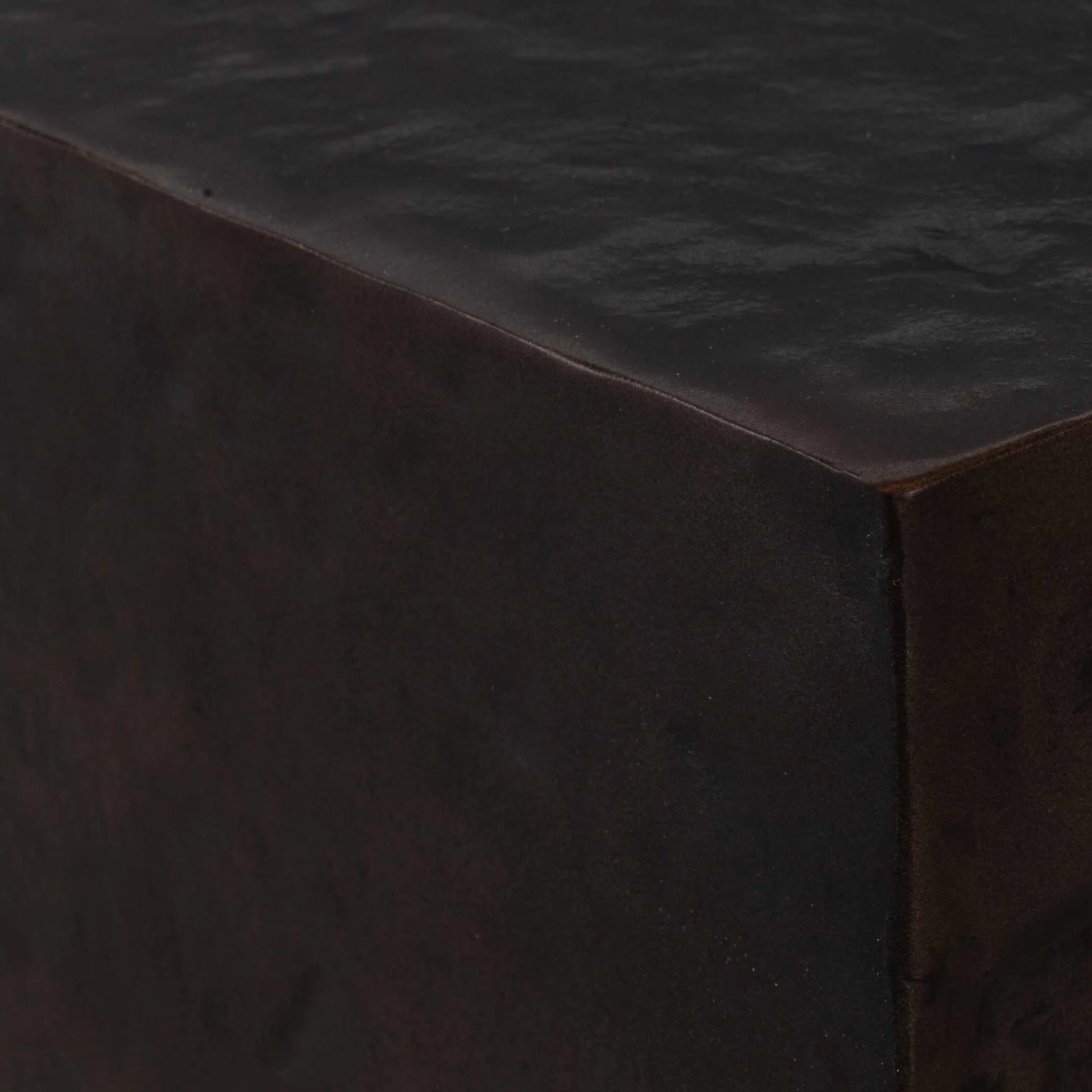 Obra Outdoor Side Table by Uttermost in dark bronze. Made from metal in a unique style.
