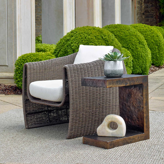 Obra Outdoor Side Table by Uttermost in dark bronze. Made from metal in a unique style.