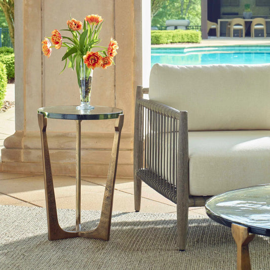 Bohdi Outdoor Accent Table by Uttermost in brass. Made from metal, glass in a unique style.