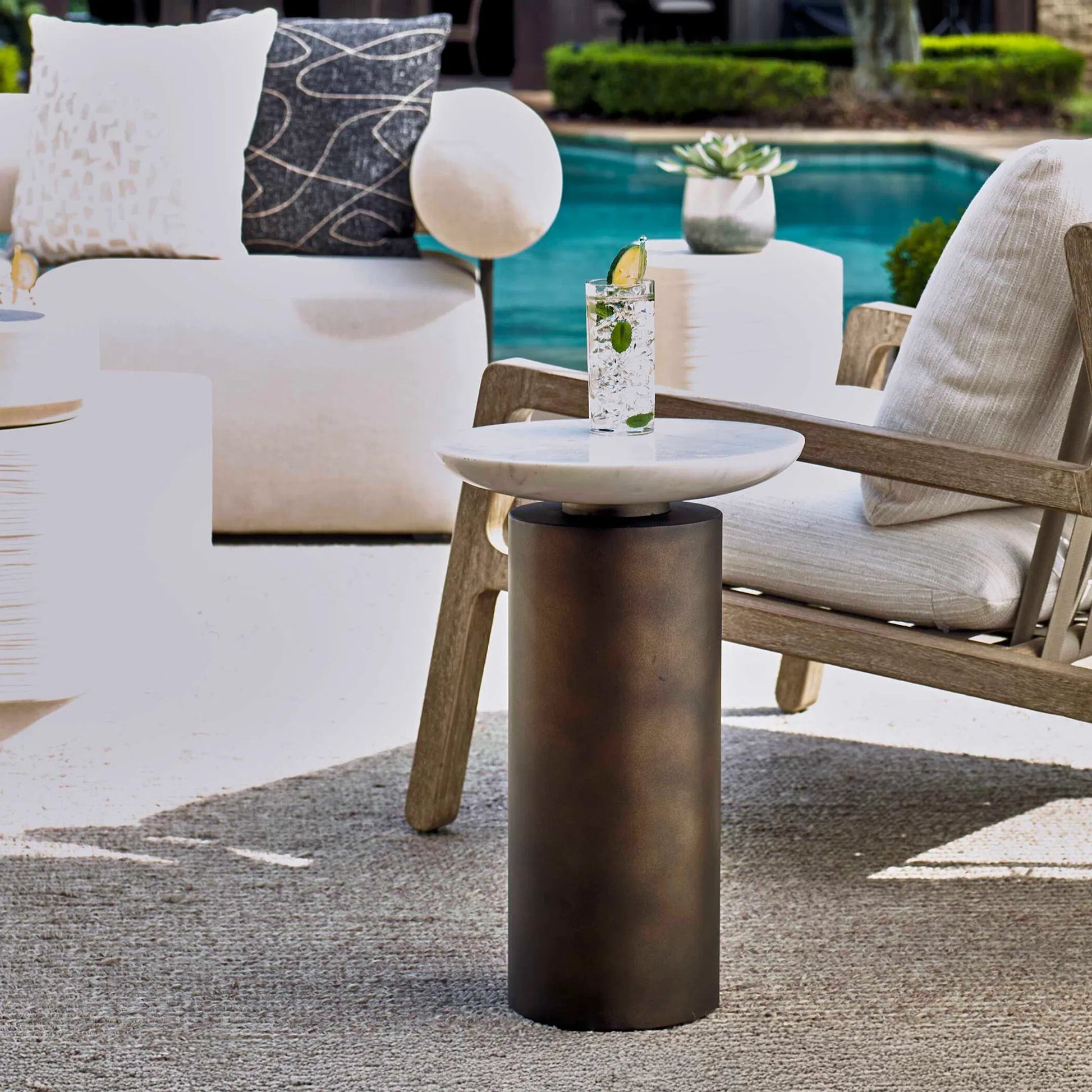 Olso Outdoor Accent Table by Uttermost in dark bronze. Made from metal, marble in a modern style.