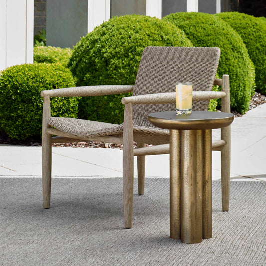 Thorp Outdoor Accent Table by Uttermost in brass. Made from metal in a unique style.