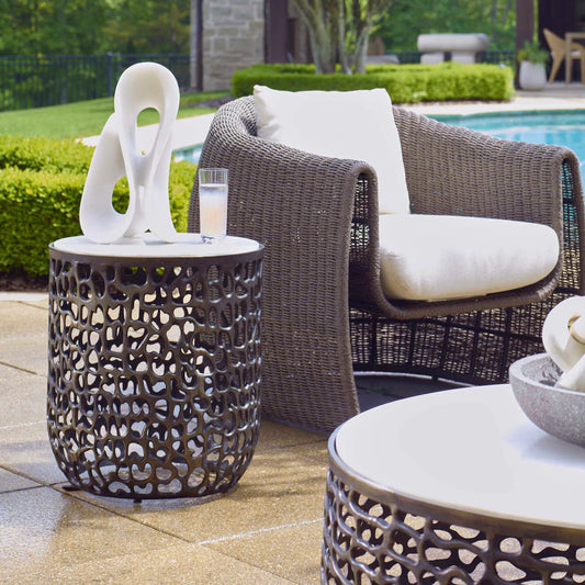 Sabena Outdoor Side Table by Uttermost in dark bronze. Made from metal, white banswara marble in a unique style.