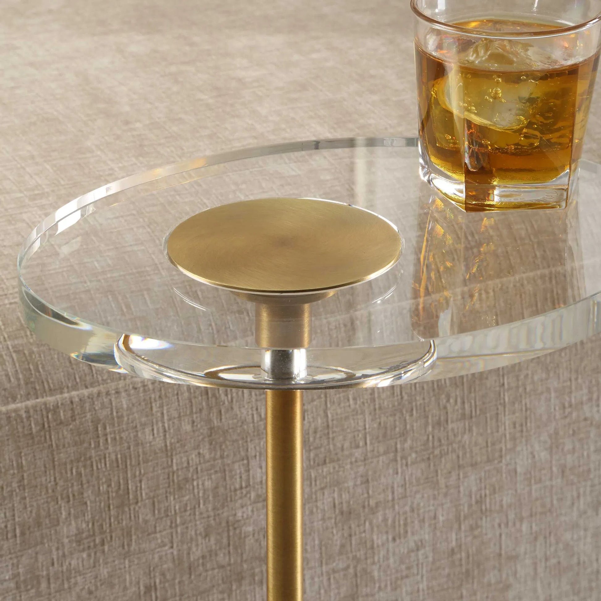 Kaufman Accent Table by Uttermost in brass. Made from metal, crystal, resin in a transitional style.