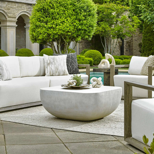 Alma Outdoor Coffee Table by Uttermost in limestone. Made from glass fiber reinforced concrete in a unique style.