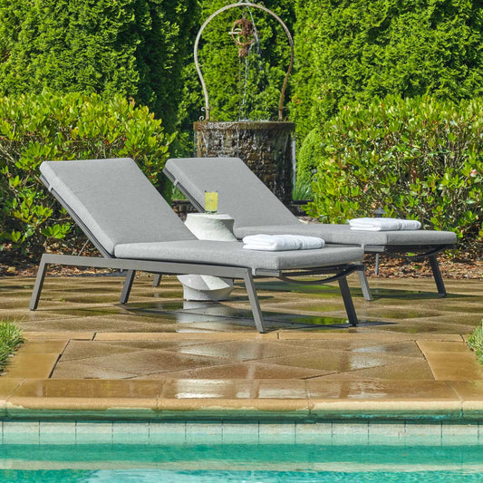 Bea Outdoor Pool Chaise by Uttermost in black. Made from aluminium, textilene vasco 909 in a unique style.