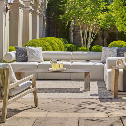 Reade Outdoor Coffee Table by Uttermost in brass. Made from aluminium in a modern style.