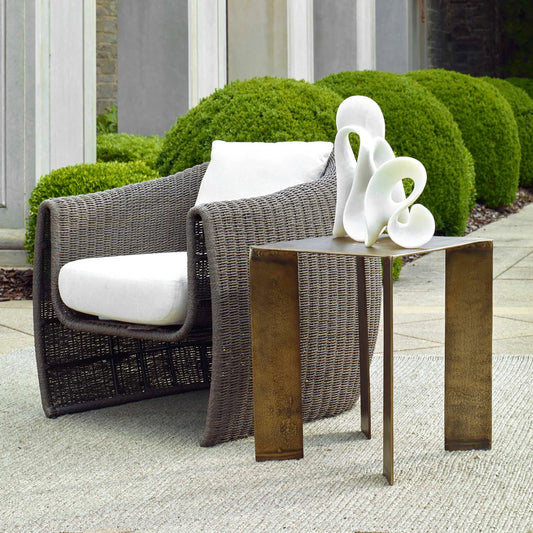 Reade Outdoor Accent Table by Uttermost in brass. Made from aluminium in a unique style.