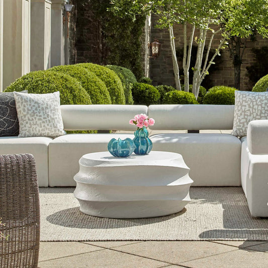 Winded Outdoor Coffee Table by Uttermost in white. Made from glass fiber reinforced concrete in a unique style.