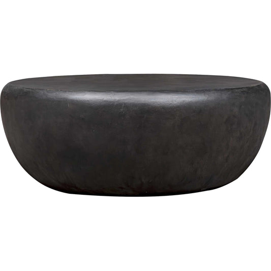 Jones Outdoor Coffee Table by Uttermost in dark stone. Made from javamix wood, plywood with resin in a unique style.