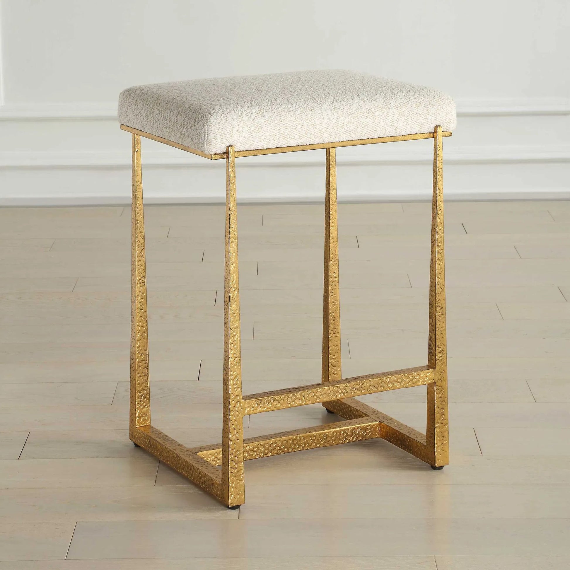 Midas Counter Stool by Uttermost. Made from iron, mdf, foam, fabric in a transitional style.