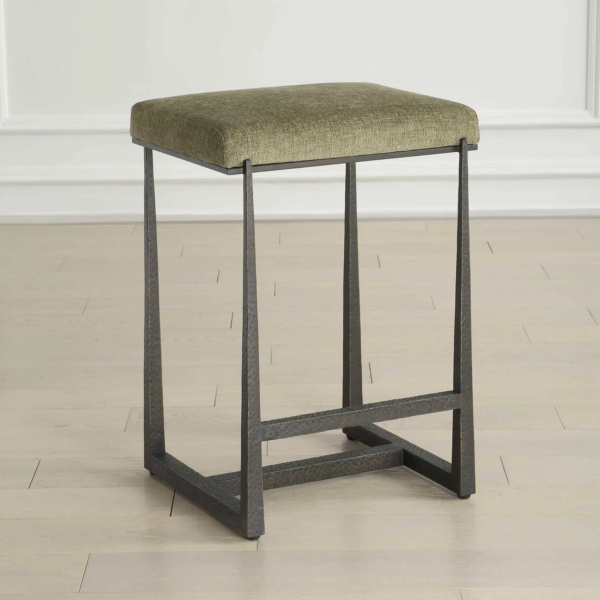 Midas Counter Stool by Uttermost. Made from iron, mdf, foam, fabric in a transitional style.