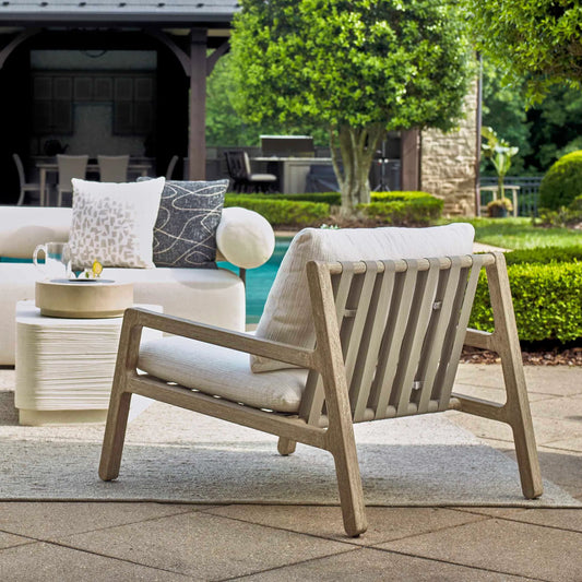 Strapped Outdoor Lounge Chair by Uttermost in ivory. Made from mahogani wood with strapped in a unique style.