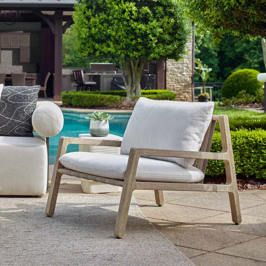 Strapped Outdoor Lounge Chair by Uttermost in ivory. Made from mahogani wood with strapped in a unique style.