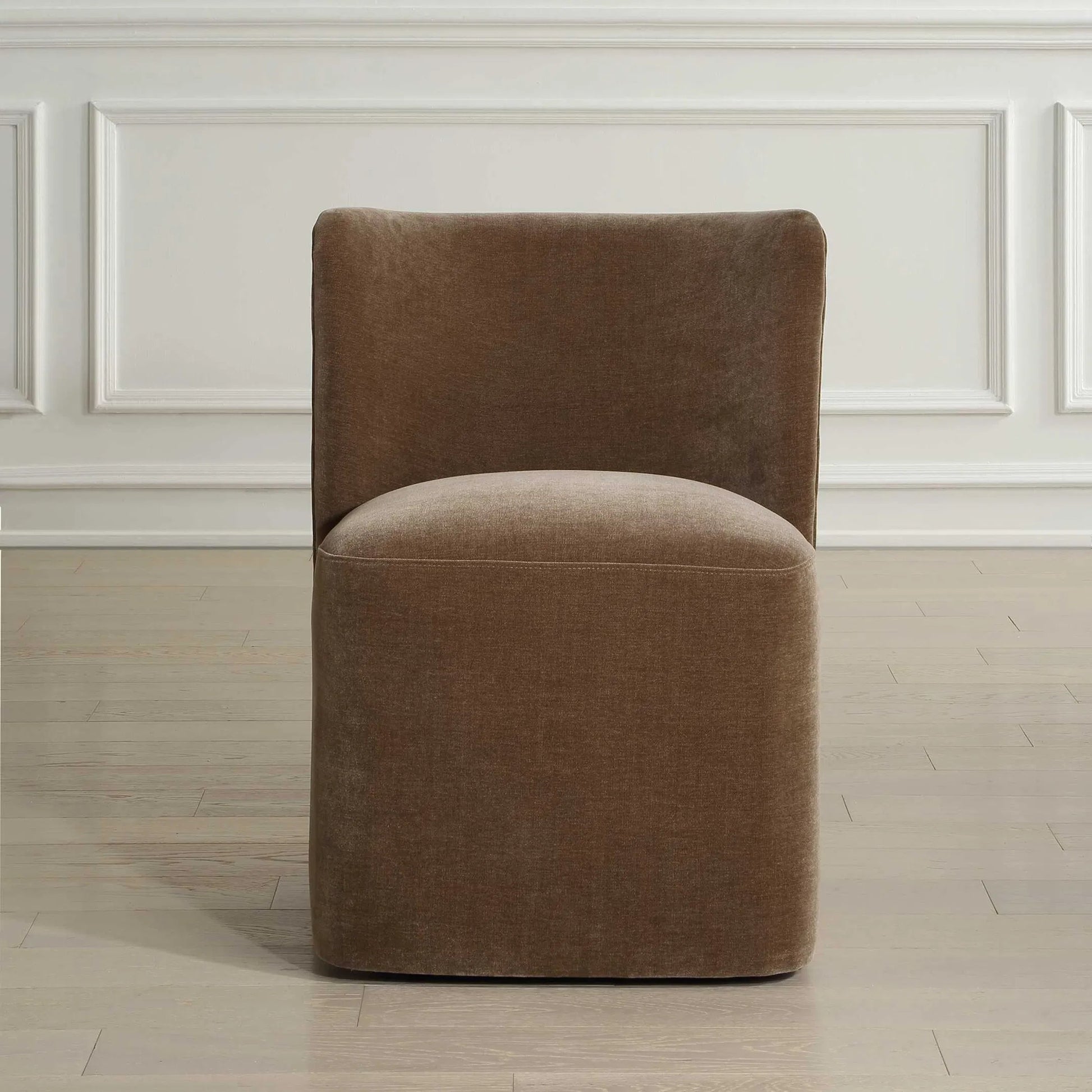 Outlook Modern Velvet Dining Chair by Uttermost in brown. Made from fabric, foam, plywood in a unique style.