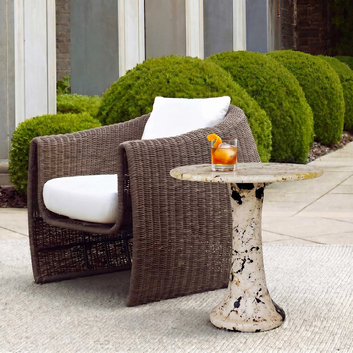 004 SI-2630676 | Unknown | Cadas Indoor/Outdoor Side Table by Uttermost in black, white and black. Made from coral stone, black resin in a unique style.