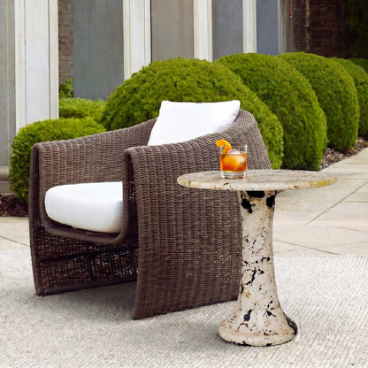 Cadas Indoor/Outdoor Side Table by Uttermost in black, white and black. Made from coral stone, black resin in a unique style.