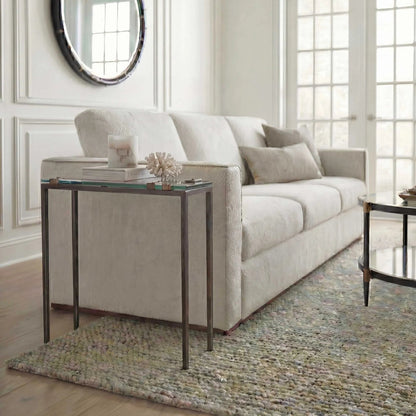 Averona Glass Top Accent Table by Uttermost in bronze and bronze. Made from iron, glass in a unique style.