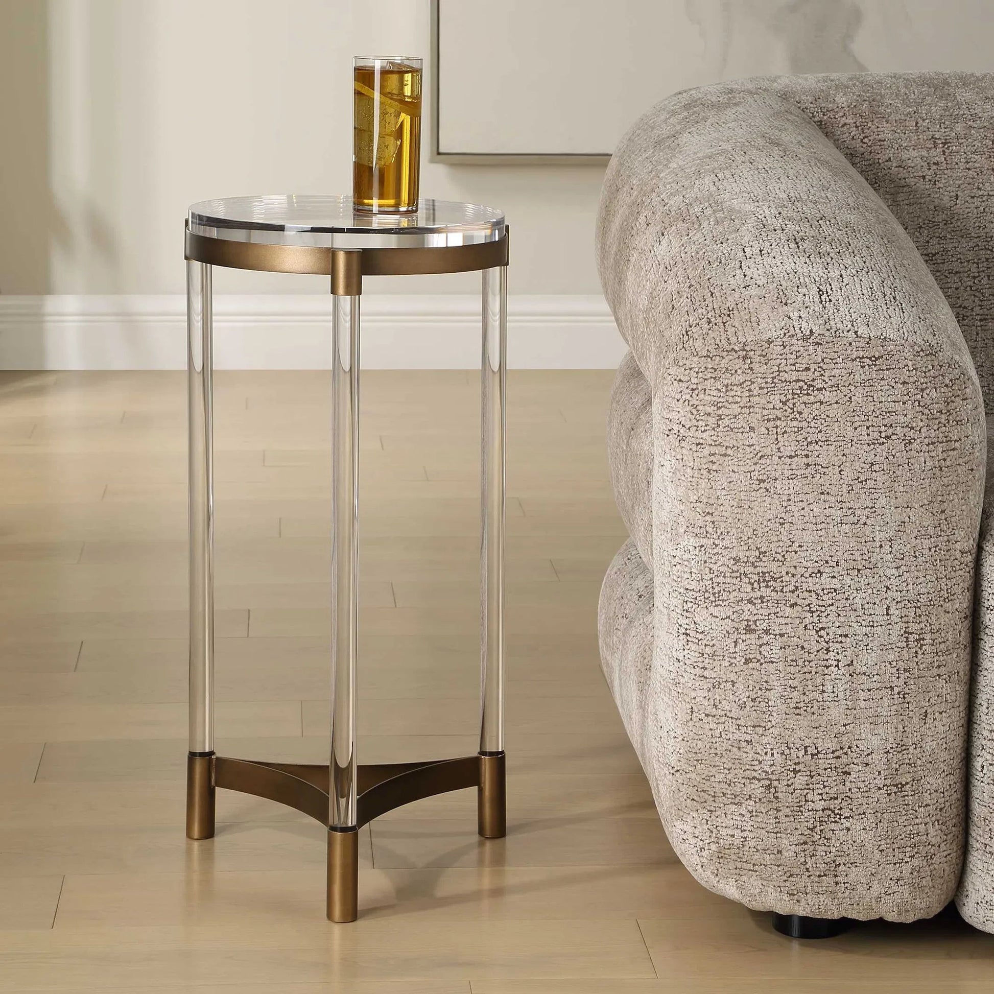 Pereira Round Acrylic Accent Table by Uttermost in bronze and bronze. Made from iron, acrylic in a unique style.