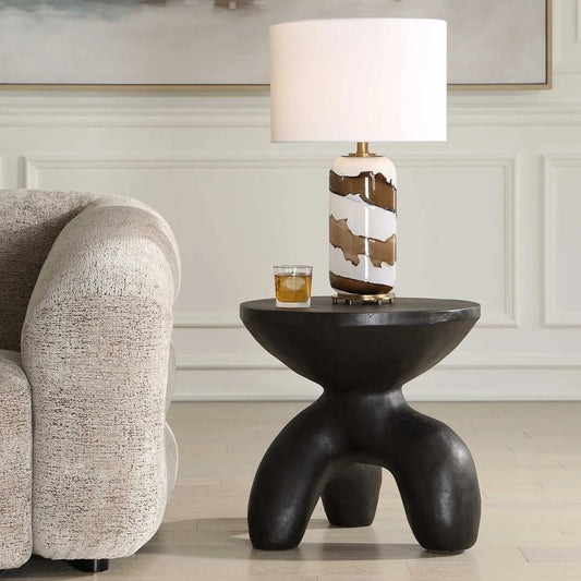 Veta Indoor-Outdoor Accent Table by Uttermost in black. Made from stone in a unique style.