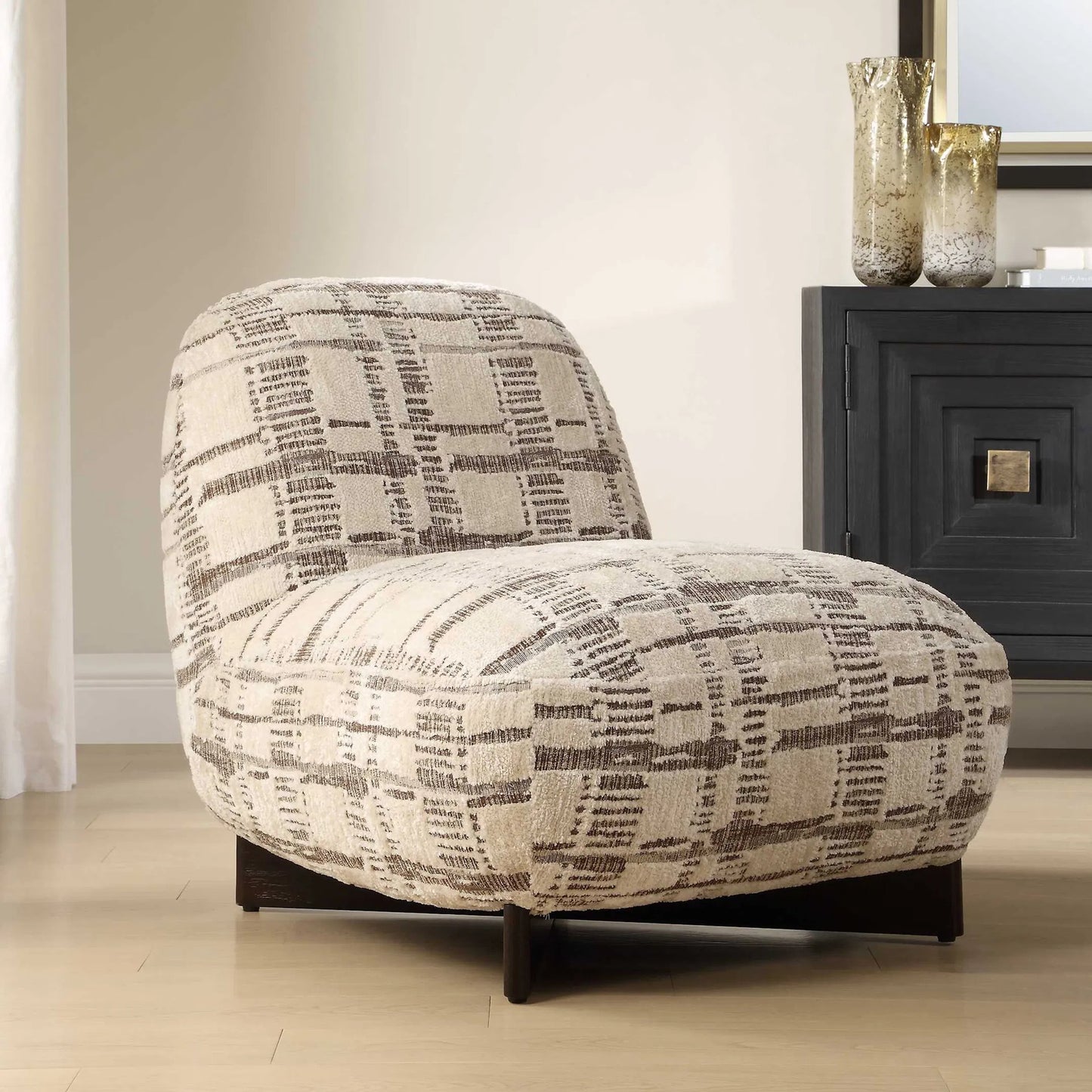 004 SI-2630772 | Unknown | Evans Modern Armless Accent Chair by Uttermost in brown and dark. Made from foam, fabric, rubber wood in a unique style.
