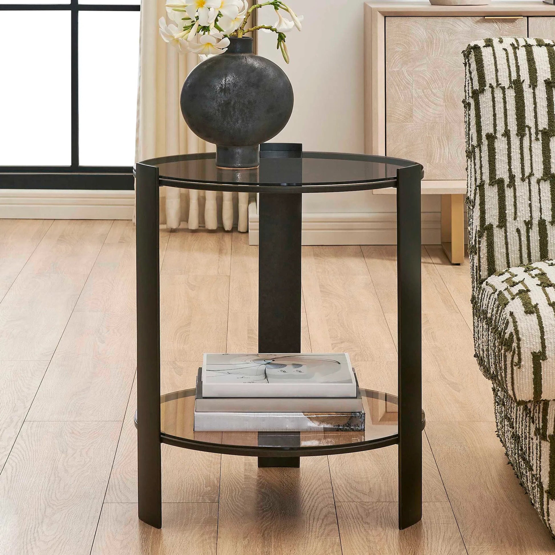 Hanson & Glass Side Table by Uttermost in bronze and dark. Made from steel, glass in a unique style.