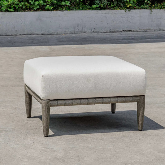 Borneo Outdoor Ottoman by Uttermost in oyster. Made from mahogani wood, fabric crescent cloud dancer in a unique style.