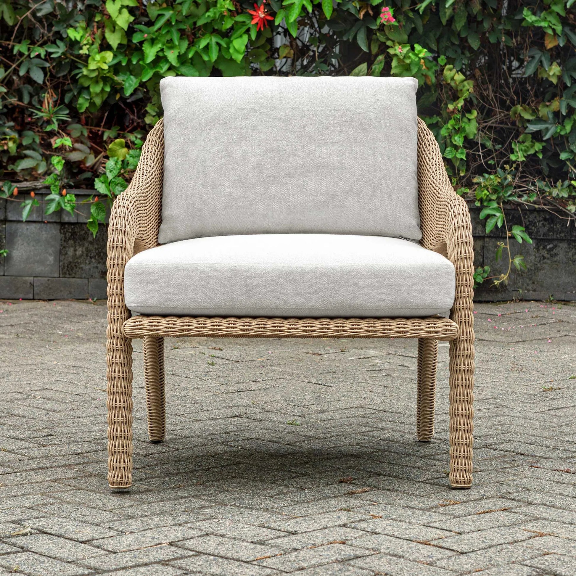 Kavali Outdoor Wicker Lounge Chair by Uttermost in white and natural honey. Made from wicker twist 3mm riviera, fabric crescent cloud dancer in a unique style.