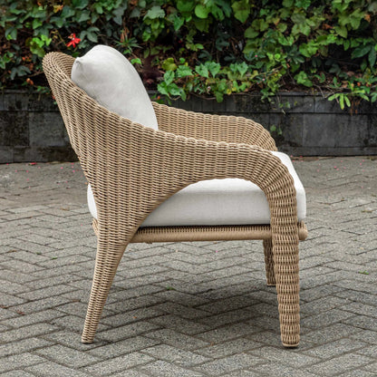 Kavali Outdoor Wicker Lounge Chair by Uttermost in white and natural honey. Made from wicker twist 3mm riviera, fabric crescent cloud dancer in a unique style.