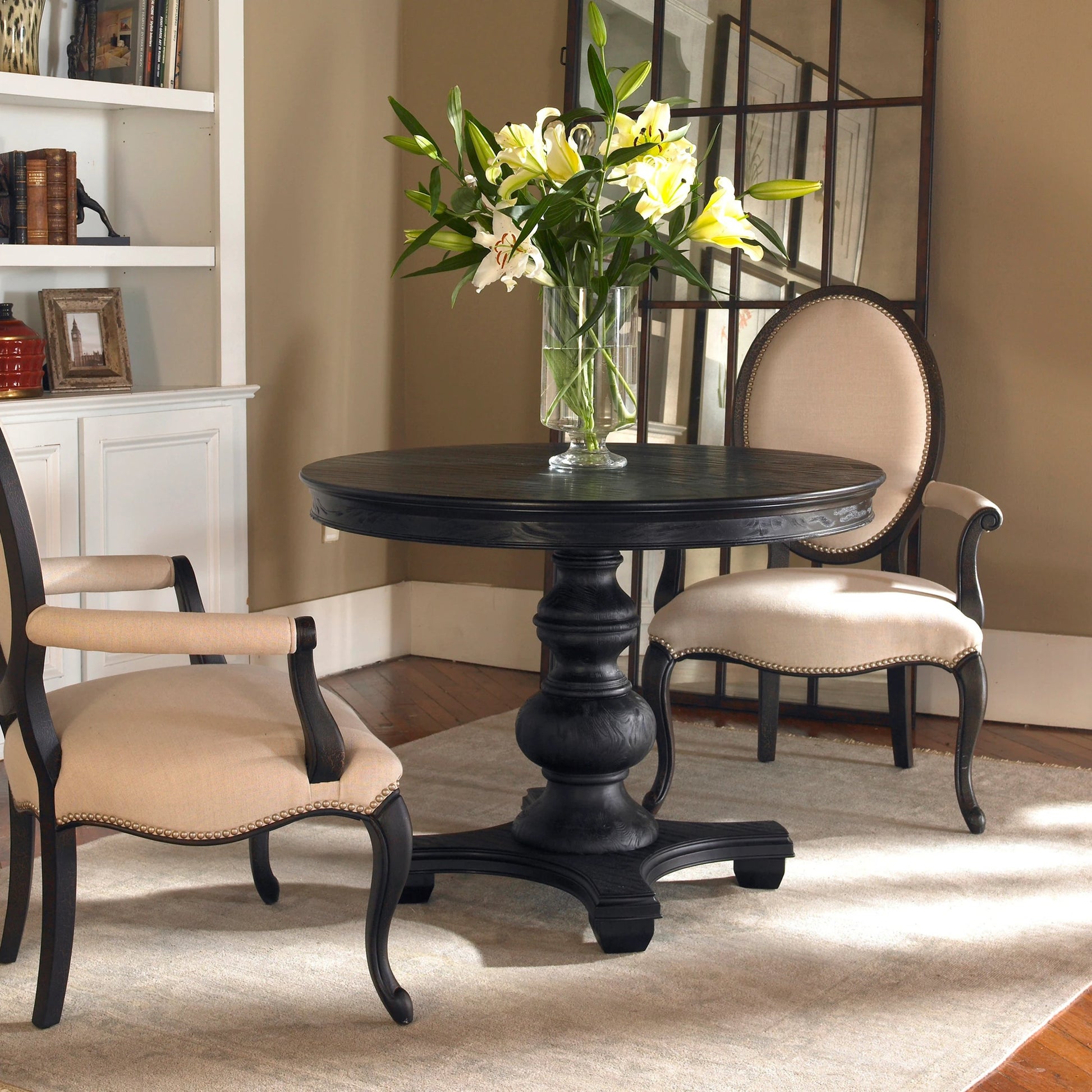 Brynmore Round Table by Uttermost. Made from wood, mdf, pu leather in a cottage & farmhouse style.