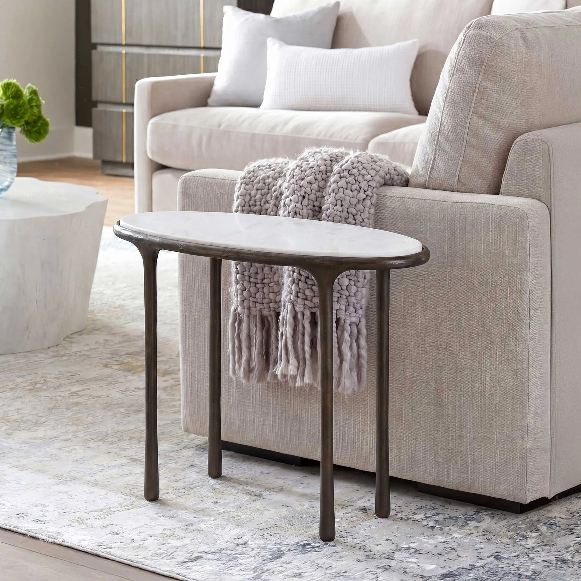 Ata Accent Table by Uttermost in bronze and dark. Made from aluminium, marble in a unique style.