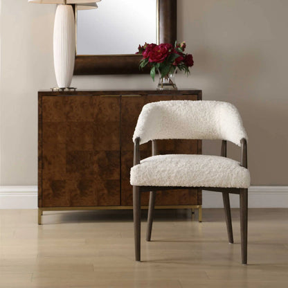 Austell Shearling Dining Chair by Uttermost in brown, white and dark. Made from rubber wood, plywood, foam, fabric in a unique style.