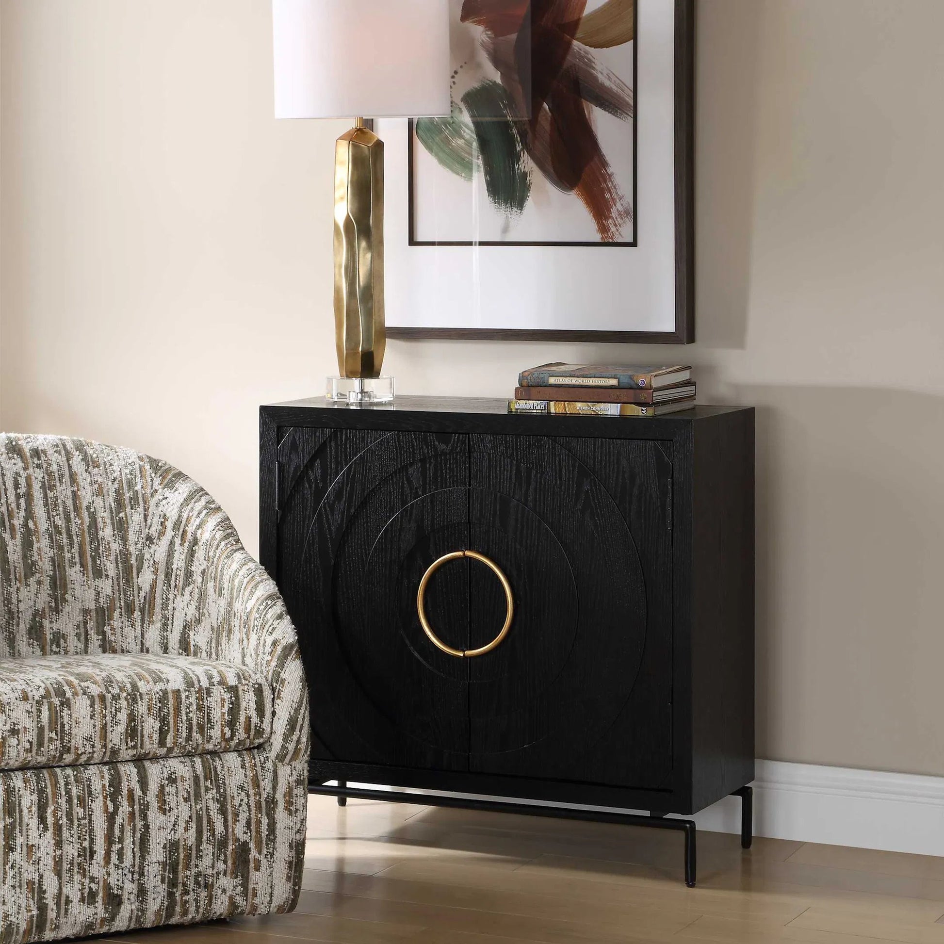Briseis 2 Door Cabinet by Uttermost in black, brass, gold and gold. Made from fir, mdf, iron, red oak veneer in a unique style.