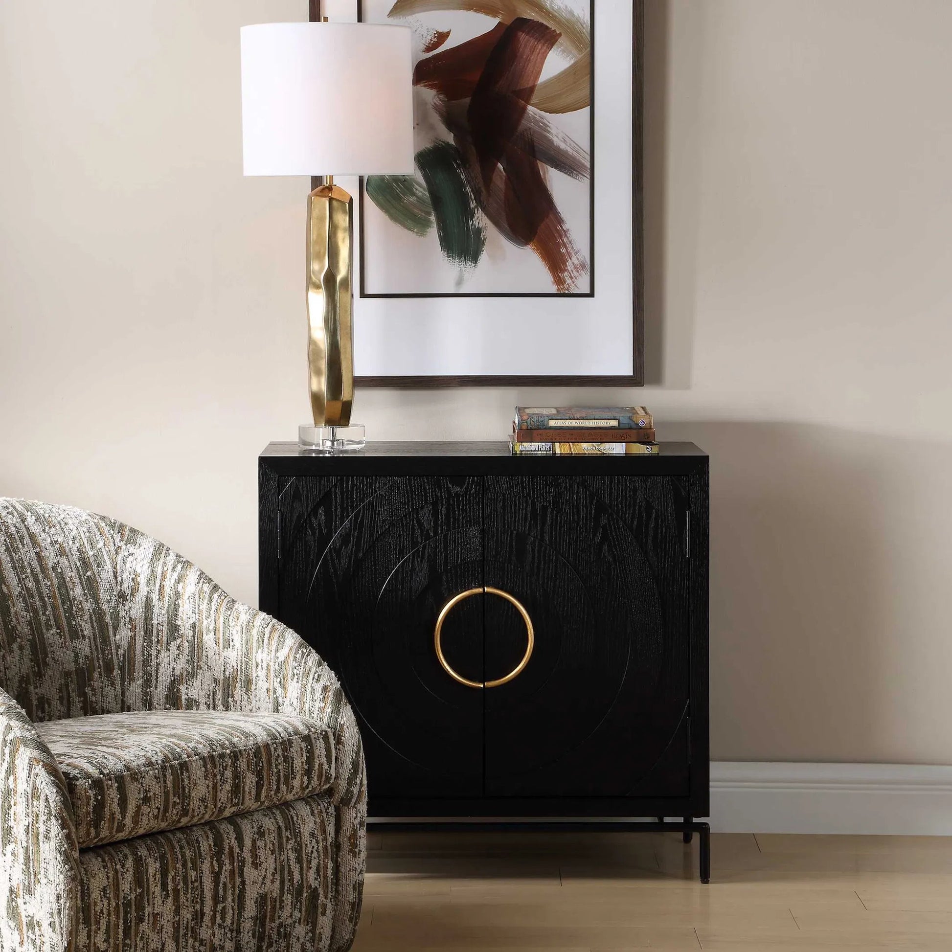 Briseis 2 Door Cabinet by Uttermost in black, brass, gold and gold. Made from fir, mdf, iron, red oak veneer in a unique style.