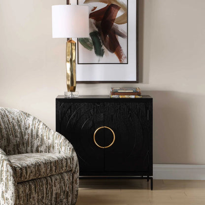 Briseis 2 Door Cabinet by Uttermost in black, brass, gold and gold. Made from fir, mdf, iron, red oak veneer in a unique style.