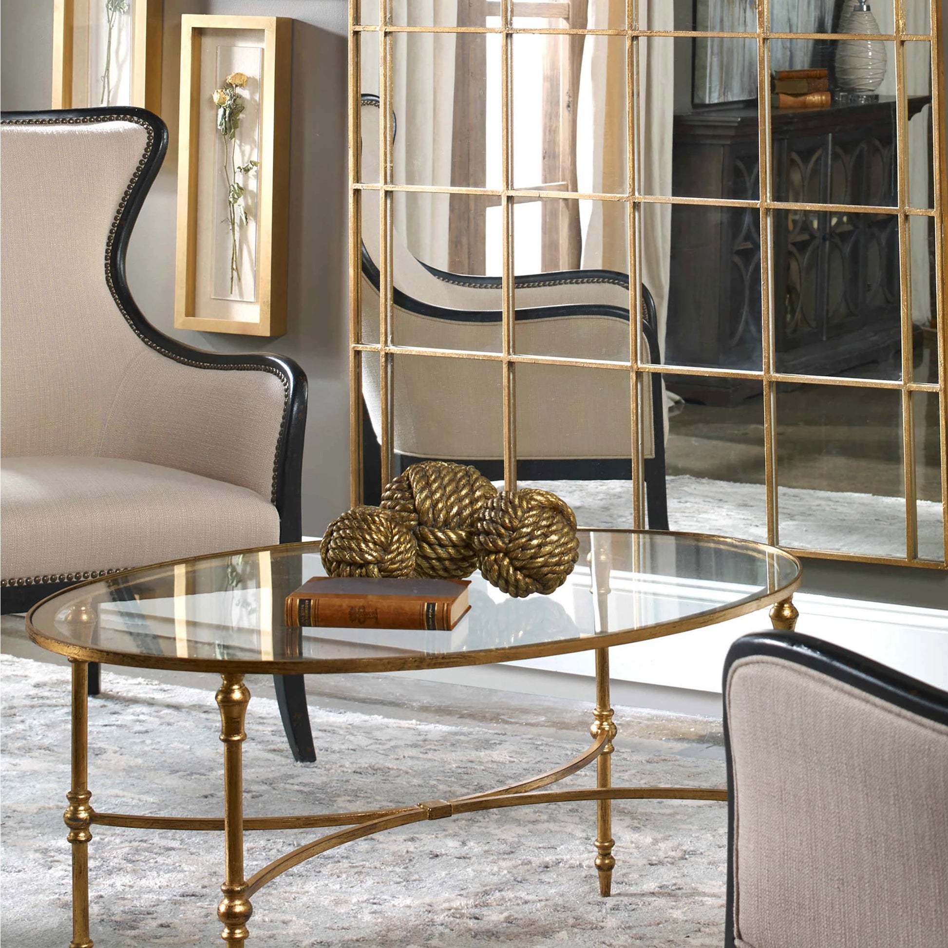 Vitya Glass Coffee Table by Uttermost. Made from metal, tempered glass in a modern style.