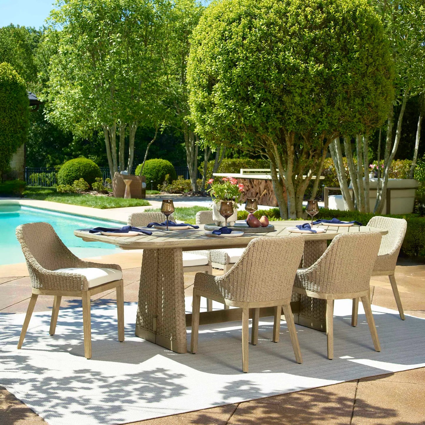 003 SI-2630763 | Lifestyle | Harbor Herringbone Indoor/Outdoor Dining Table by Uttermost in brown, woodtone and mahogany. Made from mahogany wood, wicker k-twisted 4.5mm cream white in a unique style.