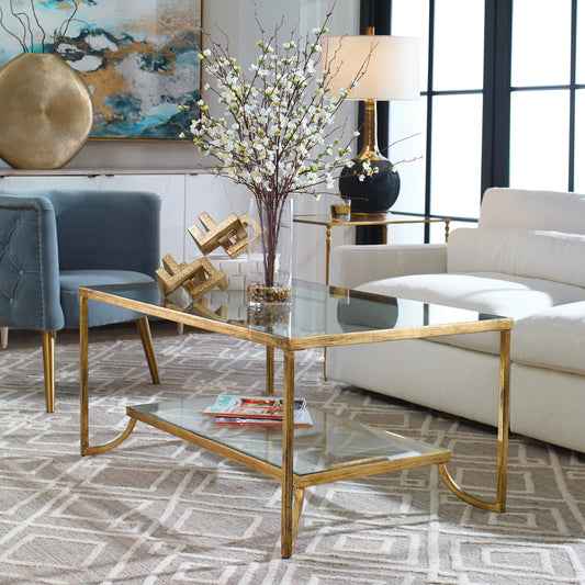 Katina Coffee Table by Uttermost in gold. Made from metal, glass in a modern style.
