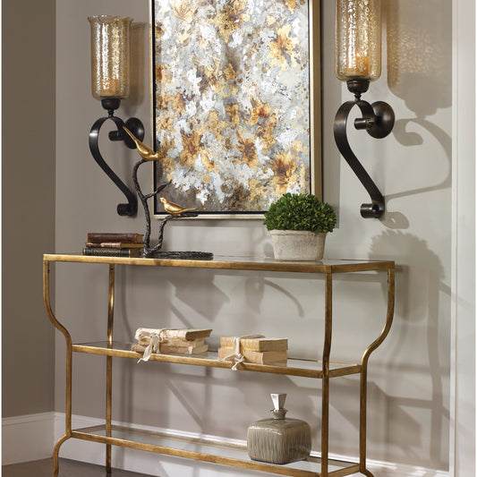 Deline Console Table by Uttermost in gold. Made from iron, glass in a modern style.