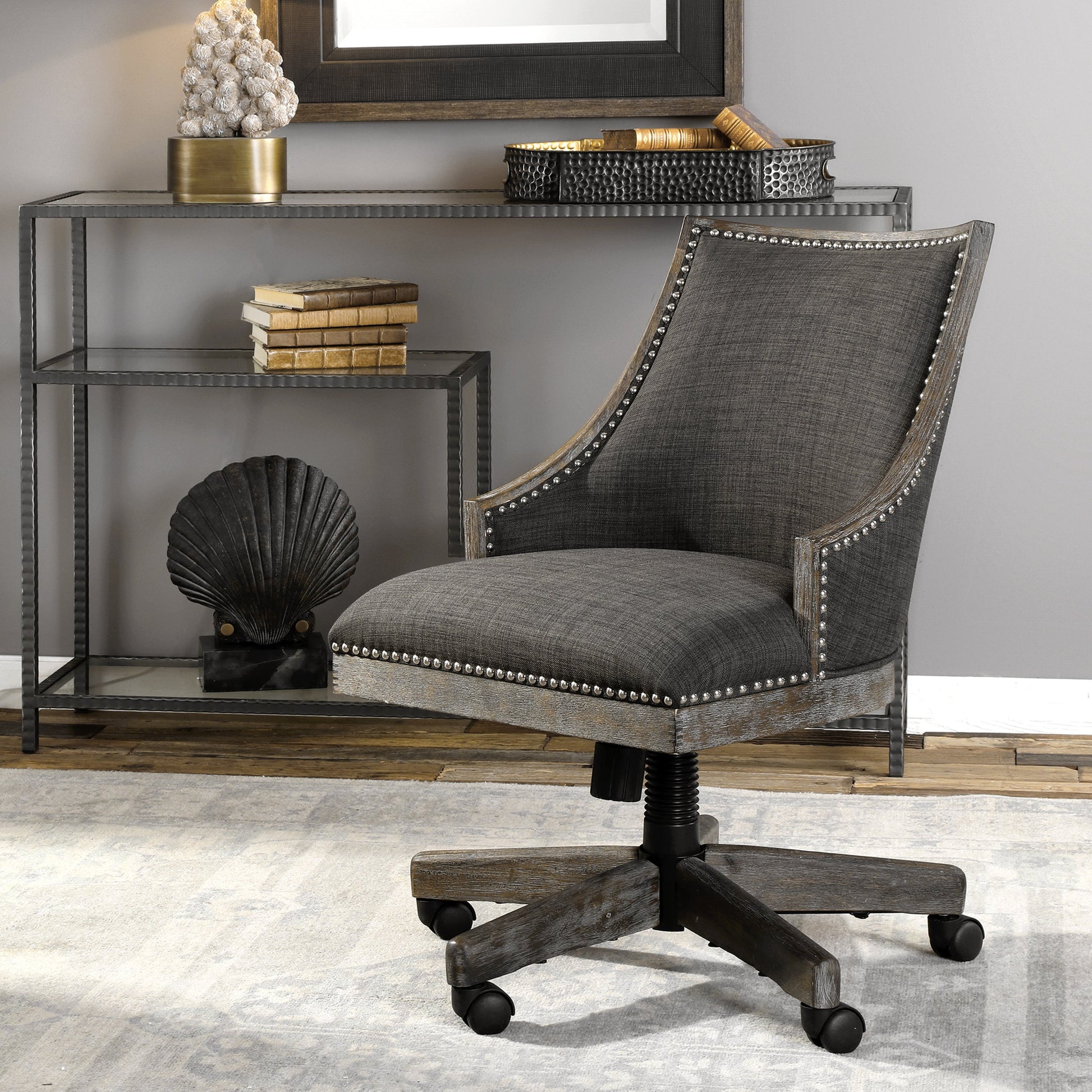 Aidrian Charcoal Desk Chair by Uttermost in charcoal. Made from metal, bent wood, plywood, fabric, foam in a cottage & farmhouse style.