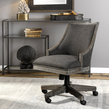 Aidrian Charcoal Desk Chair by Uttermost in charcoal. Made from metal, bent wood, plywood, fabric, foam in a cottage & farmhouse style.