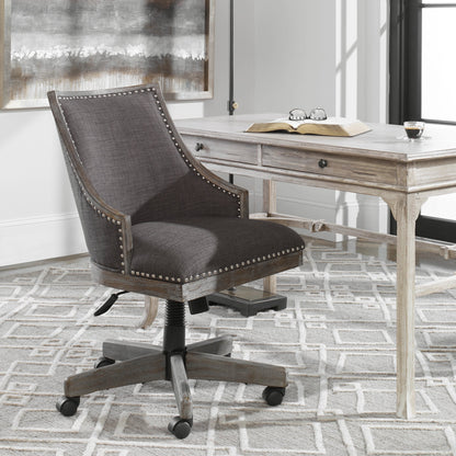Aidrian Charcoal Desk Chair by Uttermost in charcoal. Made from metal, bent wood, plywood, fabric, foam in a cottage & farmhouse style.