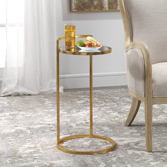 Cailin Accent Table by Uttermost in gold. Made from iron, glass, mdf in a transitional style.