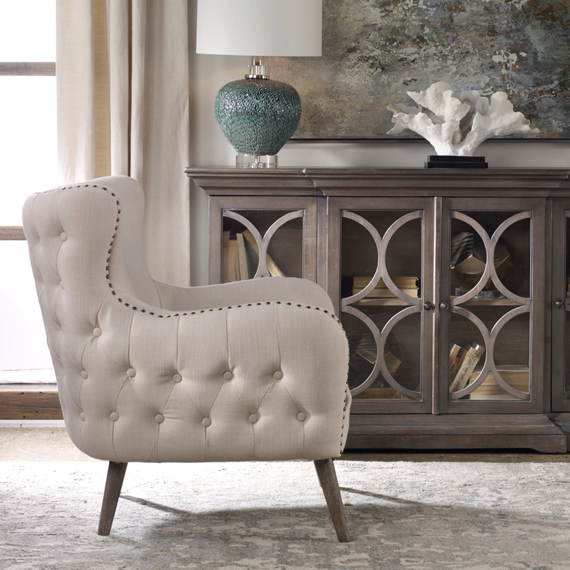 Donya Accent Chair by Uttermost. Made from fabric, foam, oak, plywood in a transitional style.