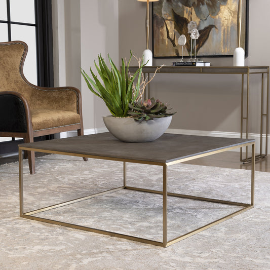Trebon Modern Coffee Table by Uttermost. Made from stainless steel, faux shargreen with wrapped mdf in a modern style.