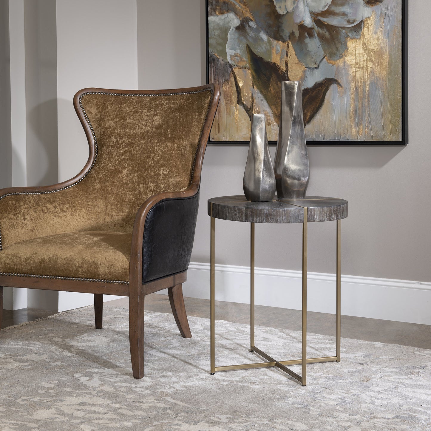 007 SR-766746 | Lifestyle | Taja Round Accent Table by Uttermost in dark walnut, gray. Made from stainless steel, acacia veneered mdf top in a modern style.