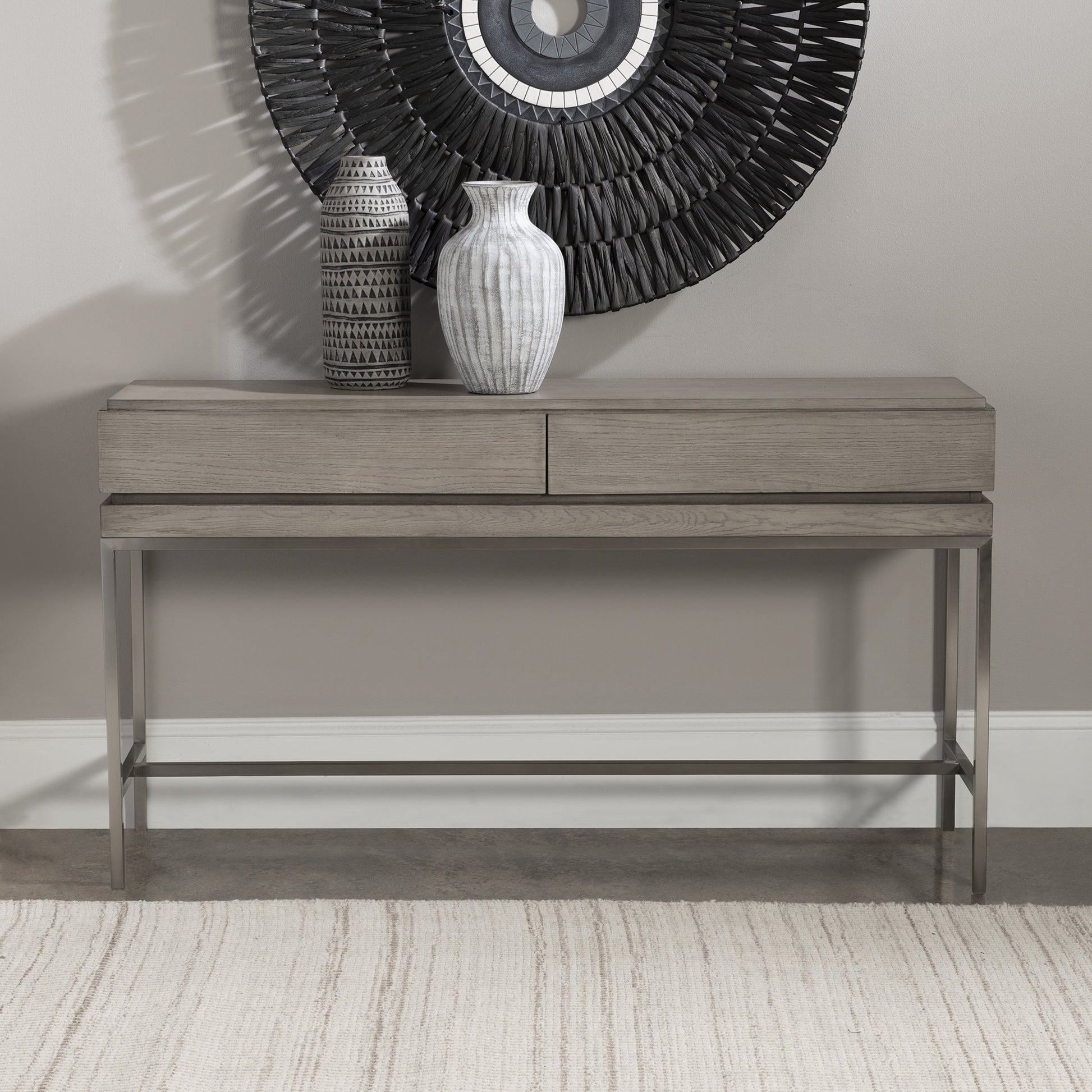 Kamala Console Table by Uttermost in gray. Made from stainless steel, mdf, oak veneer in a modern style.