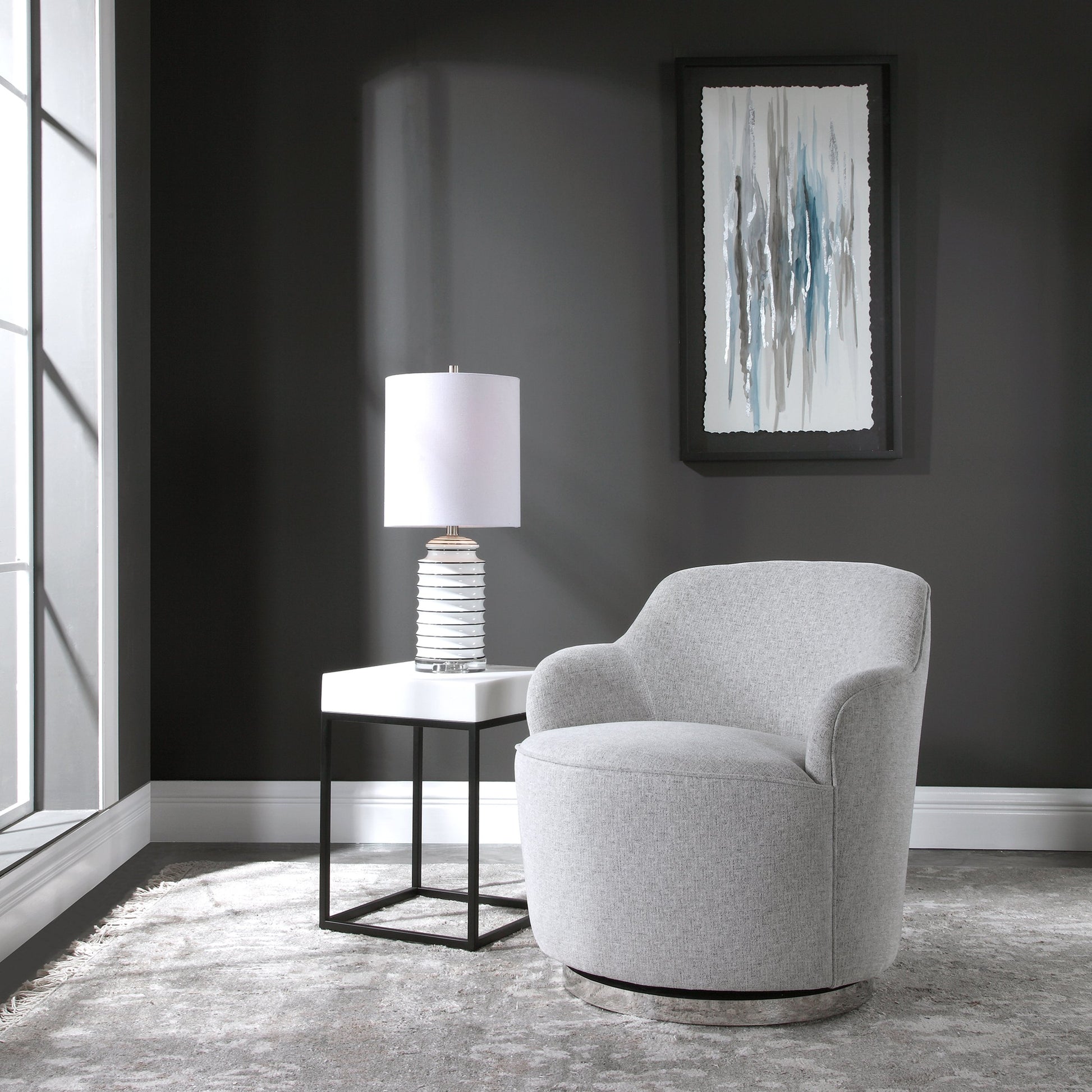 Hobart Casual Swivel Chair by Uttermost. Made from plywood, stainless steel, fabric, foam in a modern style.